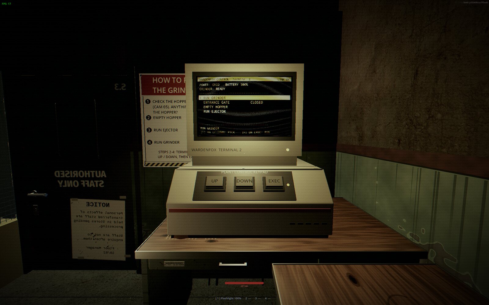 WARDENFOX Terminal 2 and its UP / DOWN / EXEC keypad, next to the how-to-run-the-grinder poster